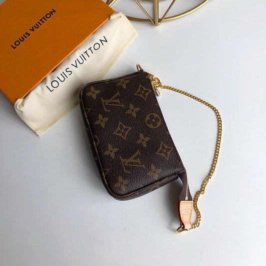 Louis Vuitton mini pochette accessoires on chain Monogram