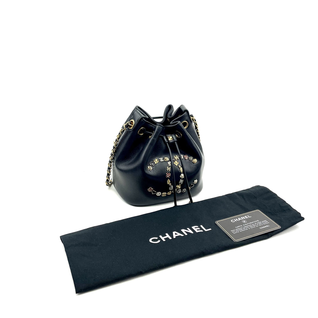 CHANEL Logo Charm CC Lambskin Drawstring Bucket Bag