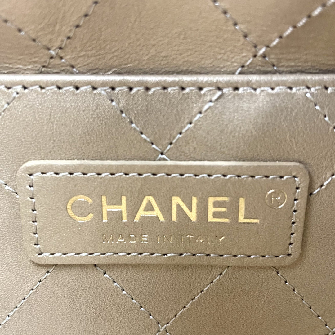 CHANEL Logo Charm CC Lambskin Drawstring Bucket Bag