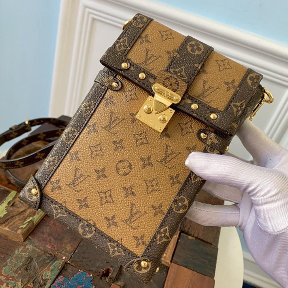 Louis Vuitton VERTICAL TRUNK POCHETTE