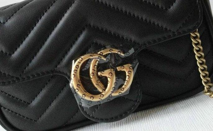 Gucci GG Marmont matelassé leather super mini bag